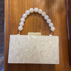 a. new. day. Cream Clutch